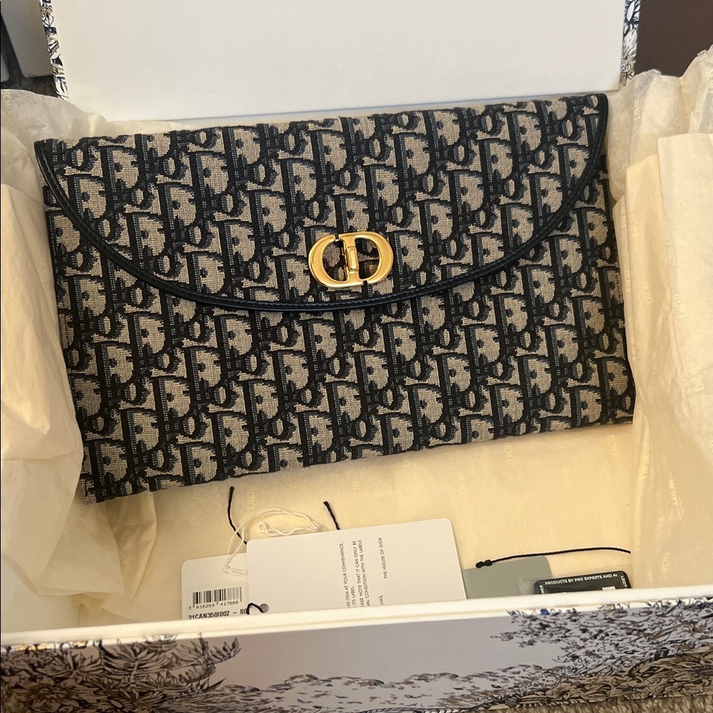 Dior Navy Monogram Clutch with Gold Clasp 
LIKE NEW FULL SET 12”x 7”